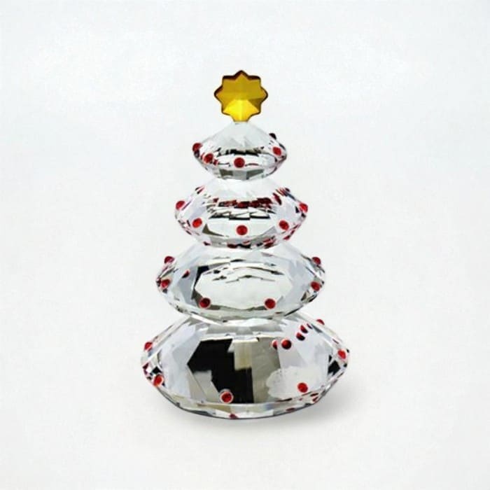 Albero di Natale in cristallo con strass rossi su base trasparente.