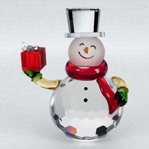 Pupazzo di neve in cristallo con cappello e regalo rosso