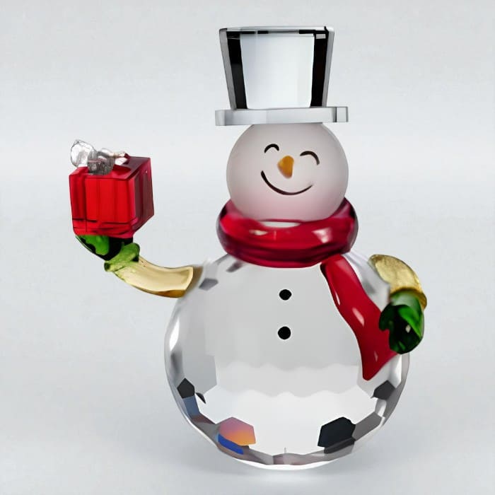 Pupazzo di neve in cristallo con cappello e regalo rosso